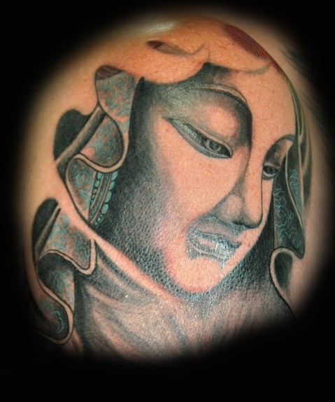Black and gray face tattoo