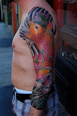 Tattoos Traditional American tattoos koi lotus and mantra sleeve main 