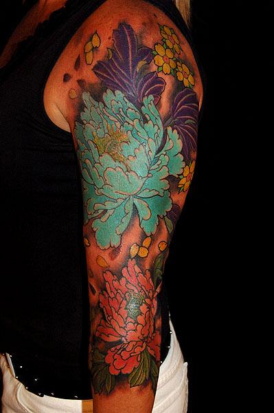 Dana Helmuth - peony and blossom tattoo with misty background