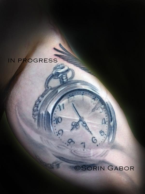 Realistic black and gray pocket watch tattoo by Sorin Gabor Tattoos