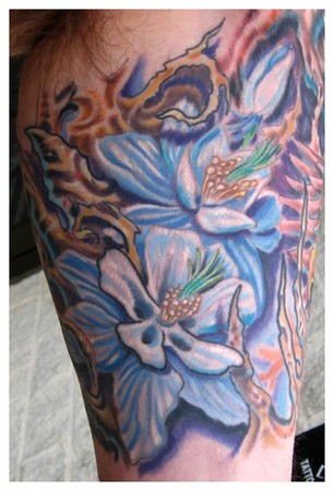 Looking for unique Phil Robertson Tattoos?  Columbine flower tattoo