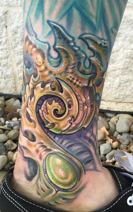 Phil Robertson - Biomech coil tattoo