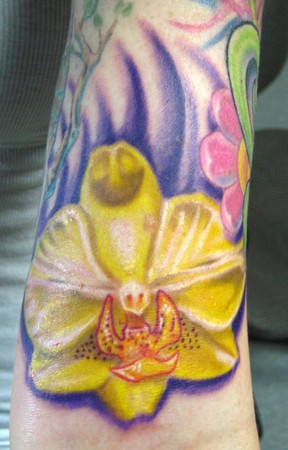 orchid flower tattoo. black orchid tattoo.