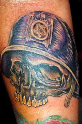 Aran Campas - Skull with helmet and Slayer eagle tattoo