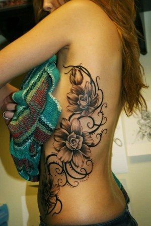 flower tattoos on ribs for girls