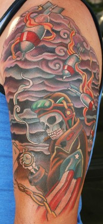 Teresa Sharpe - semi-traditional war themed half sleeve