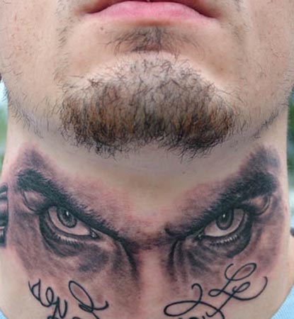 Looking for unique Black and Gray tattoos Tattoos?  eyes on throat 