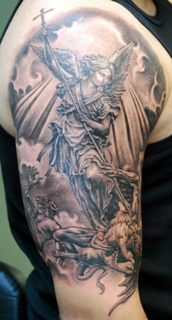 slaying the devil. black and grey St Michael tattoo