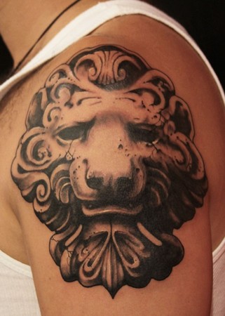 Looking for unique Gene Coffey Tattoos Lion Statue Tattoo