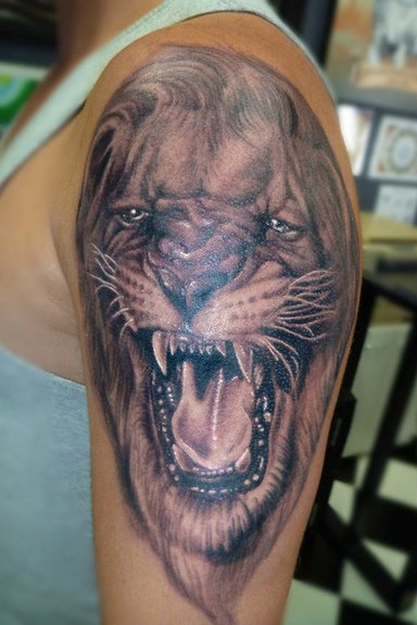 Black and Gray Lion Tattoo