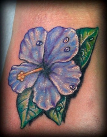 hawaiian flower tattoos on foot. More foot tattoos at www.foot-tattoo.com!