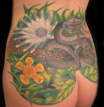 Comments Snake Ass with Tropical Flowers CoverUp Tattoo Markuss Decker
