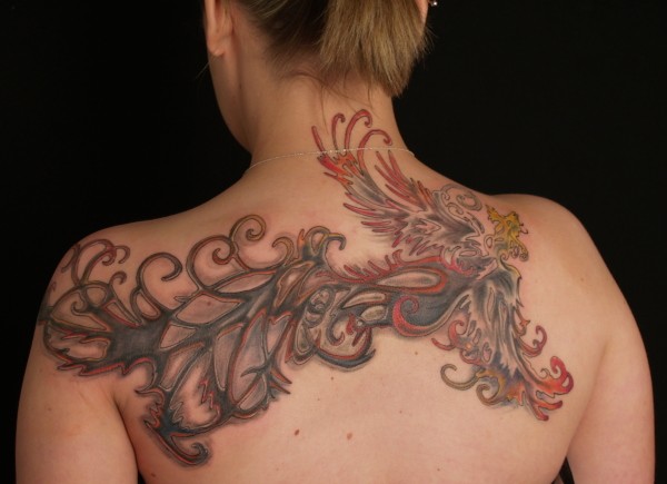 swirly tattoos. Phoenix swirly tattoo