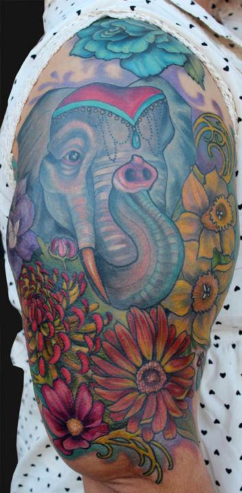 Katelyn Crane - Elephant and Birth flower tattoo