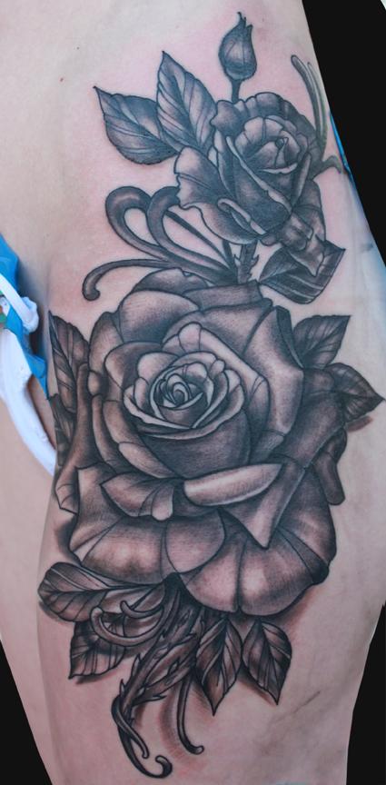 Katelyn Crane - Black and Grey rose tattoo 