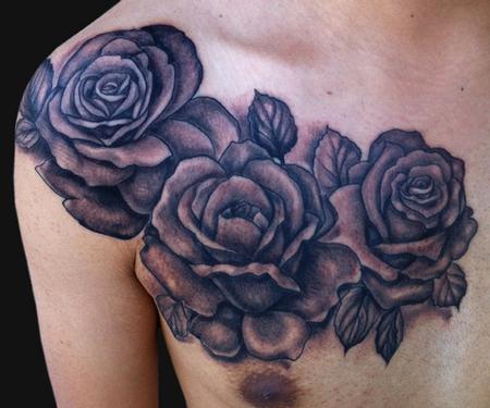 Katelyn Crane - Black and grey rose tattoo