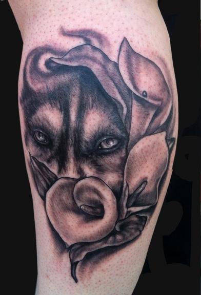 Katelyn Crane - Wolf eyes and Cala Lily tattoo