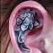 Snoops Black and gray Lotus Ear Piece Tattoo Design Thumbnail