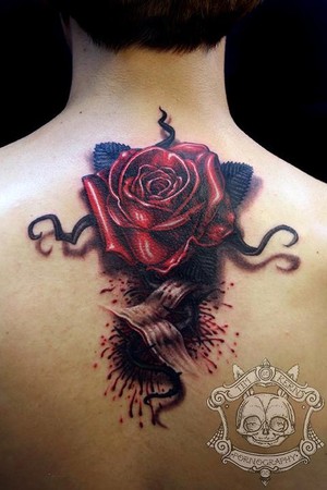 rose back tattoo