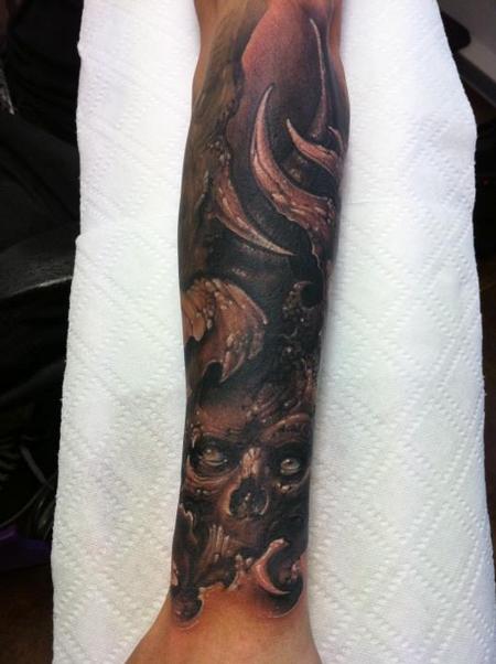 Tommy Lee Wendtner skull forearm half sleeve tattoo