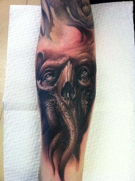 Tommy Lee Wendtner - evil forearm skull tattoo