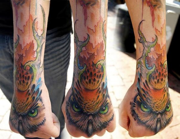 Owl hand tattoo