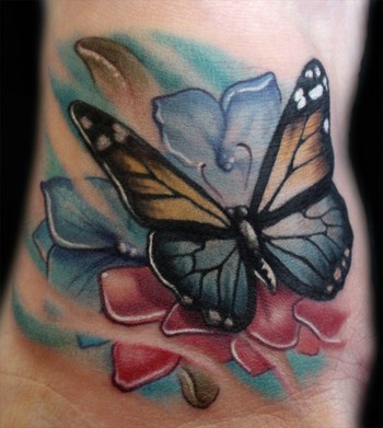 unique butterfly tattoo design
 on Kelly Doty at Ink & Dagger Tattoo