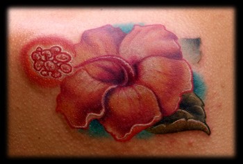 Kelly Doty - Canary Hibiscus Flower tattoo