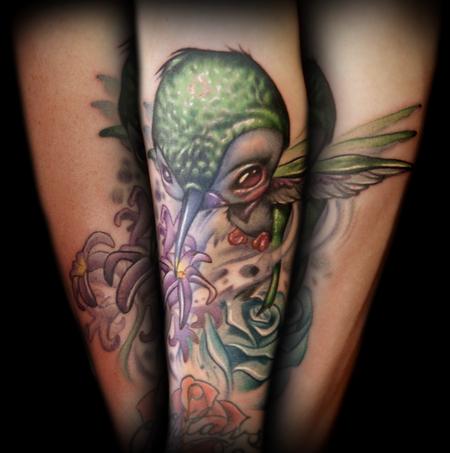 Kelly Doty - Creepy Big-Headed Hummingbird tattoo