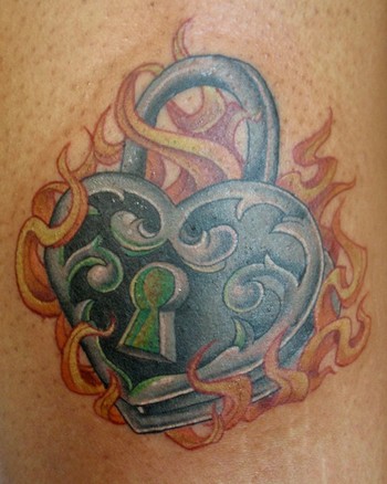 lock tattoos. lock and flames, a tattoo