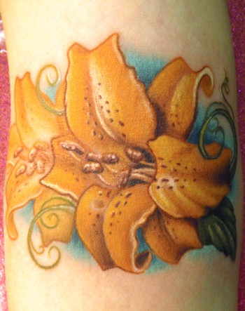 Comments This is a tiger lily tattoo a long time in the making on my good 