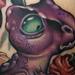 Dinosaur vs. Cupcake tattoo Tattoo Thumbnail