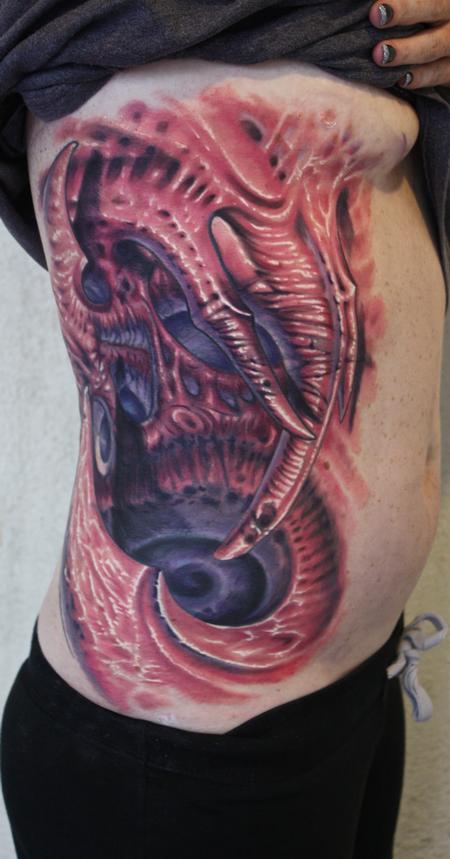 Ty McEwen - bio organic rib tattoo