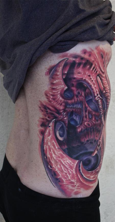 Ty McEwen - bio organic rib tattoo