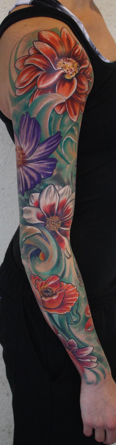 Ty McEwen flower sleeve tattoo