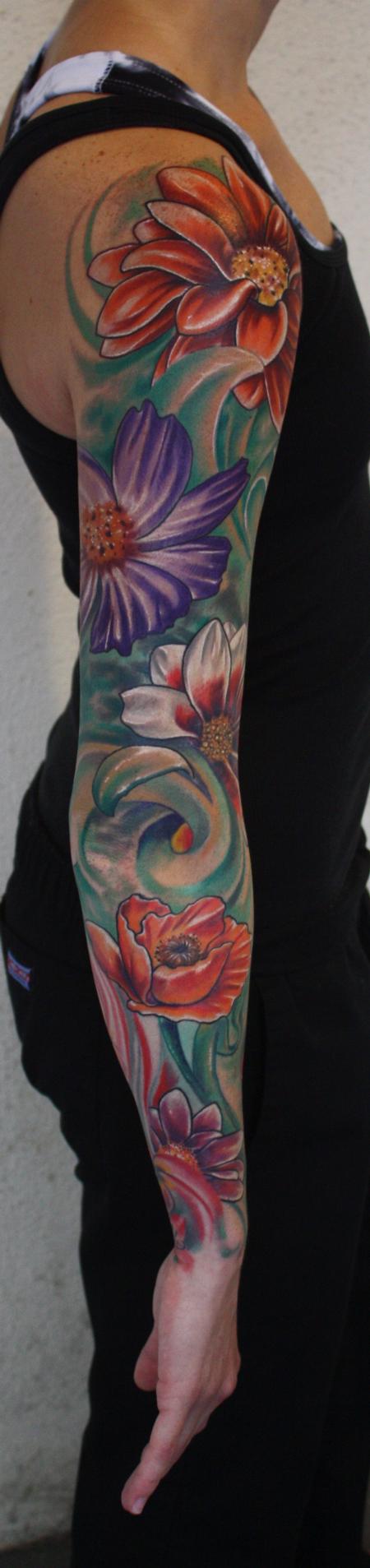 Ty McEwen - color flower tattoo sleeve