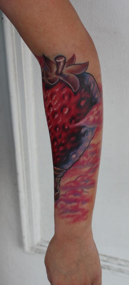 Ty McEwen - strawberry tattoo
