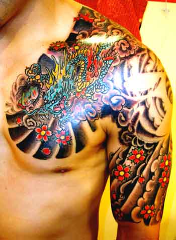 Tattoos Alex Sherker Dragon Sakura chest sleeve