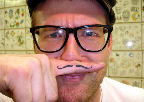 Tattoos - Alex Sherker - pringles moustache