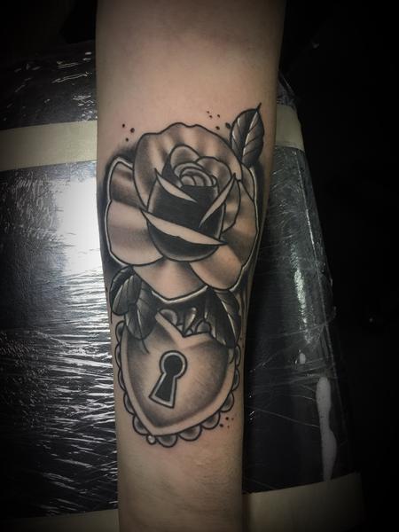 Dylan Talbert Davenport - Her rose and lock tattoo