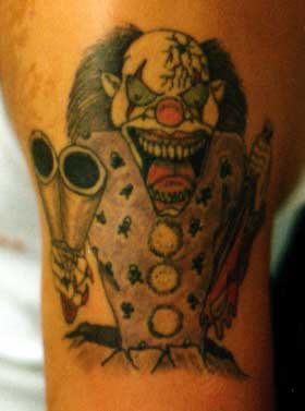 Really bad tattoo - Clown With guns