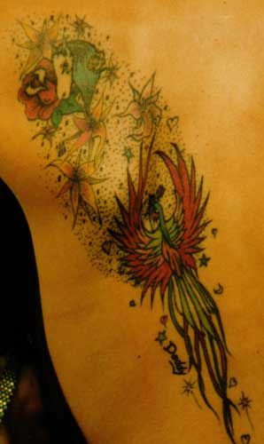 Really bad tattoo - Bird with flowers