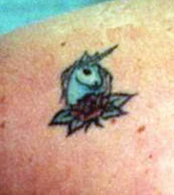 really bad tattoos. Really bad tattoo - Unicorn