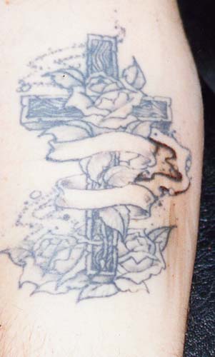 Really bad tattoo - Cross with Banner