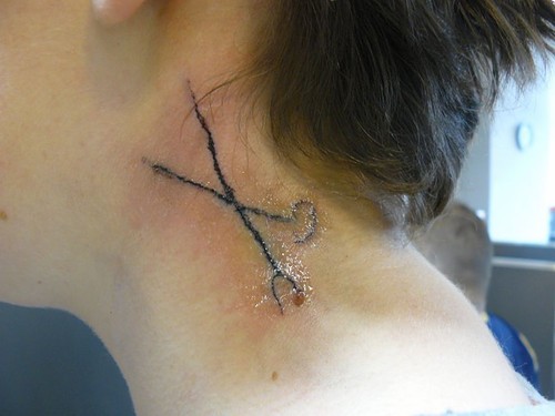 really bad tattoos. Really bad tattoo - neck