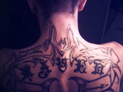  Tattoo Tribal on Bad Tattoos   Tribal Back Tattoo