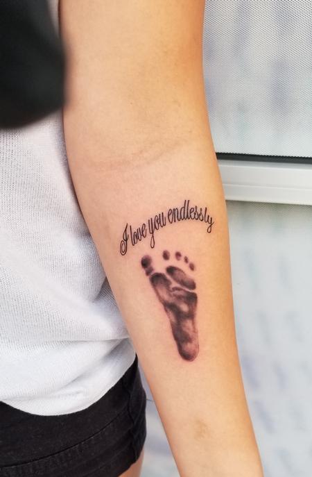 Tattoos - footprint and script - 139990