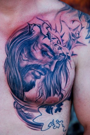 Comments Chest plate Jesus tattoo black and gray tattoo in progress