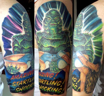 Tattoos - Julio Rodriguez - creature half sleeve