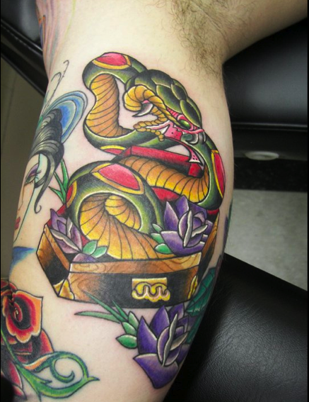 Custom snake tattoo